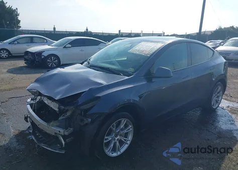 2023 Tesla Model Y Awd/Long Range Dual Motor All-Wheel Drive z USA, uszkodzony, nr VIN 7SAYGDEE8PF887386